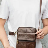 Tobias™ | Bolsa Crossover em Couro