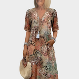 Vestido Arejado com Padrão de Verão e Decote em V